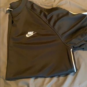 Large black Nike polo